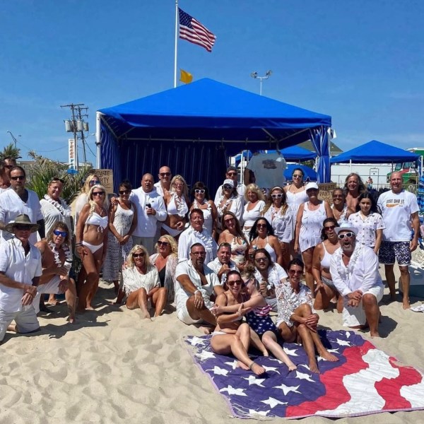 a group of people on a beach