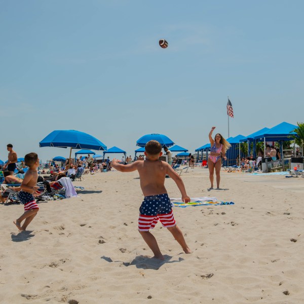 a group of people on a beach