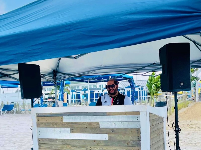 a person standing in front of a mountain